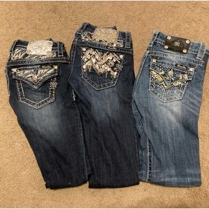 3 pairs of Miss Me boot cut jeans size 23 waist